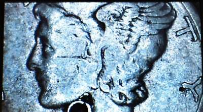 1929 Mercury dime die crack error showing raised metal line crossing Liberty's portrait toward the rim